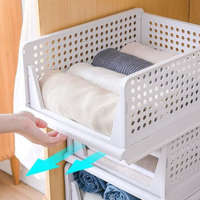 Foldable 3-layer organizer for clothes, ideal for use in wardrobes or cupboards.